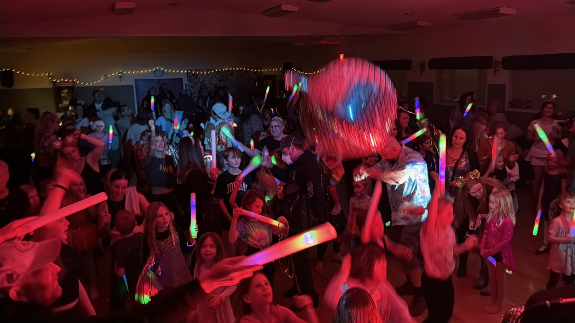 Families on the New Year's Eve dance floor